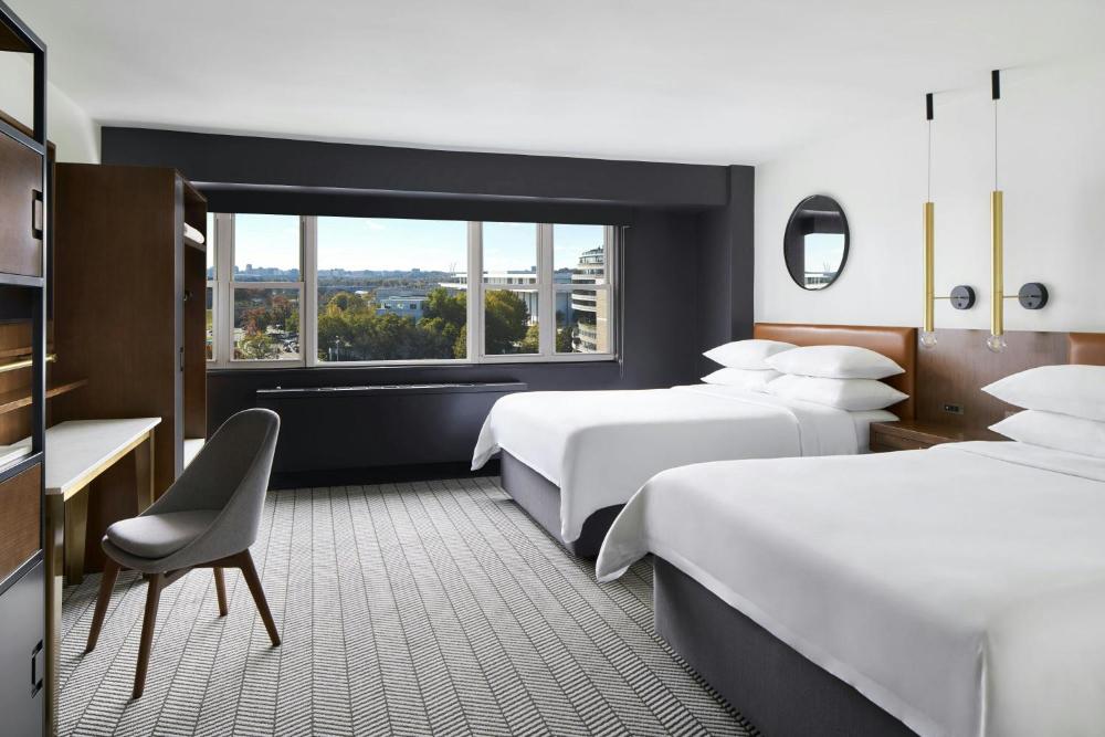 Deluxe Queen Room with Two Queen Beds and City View interior